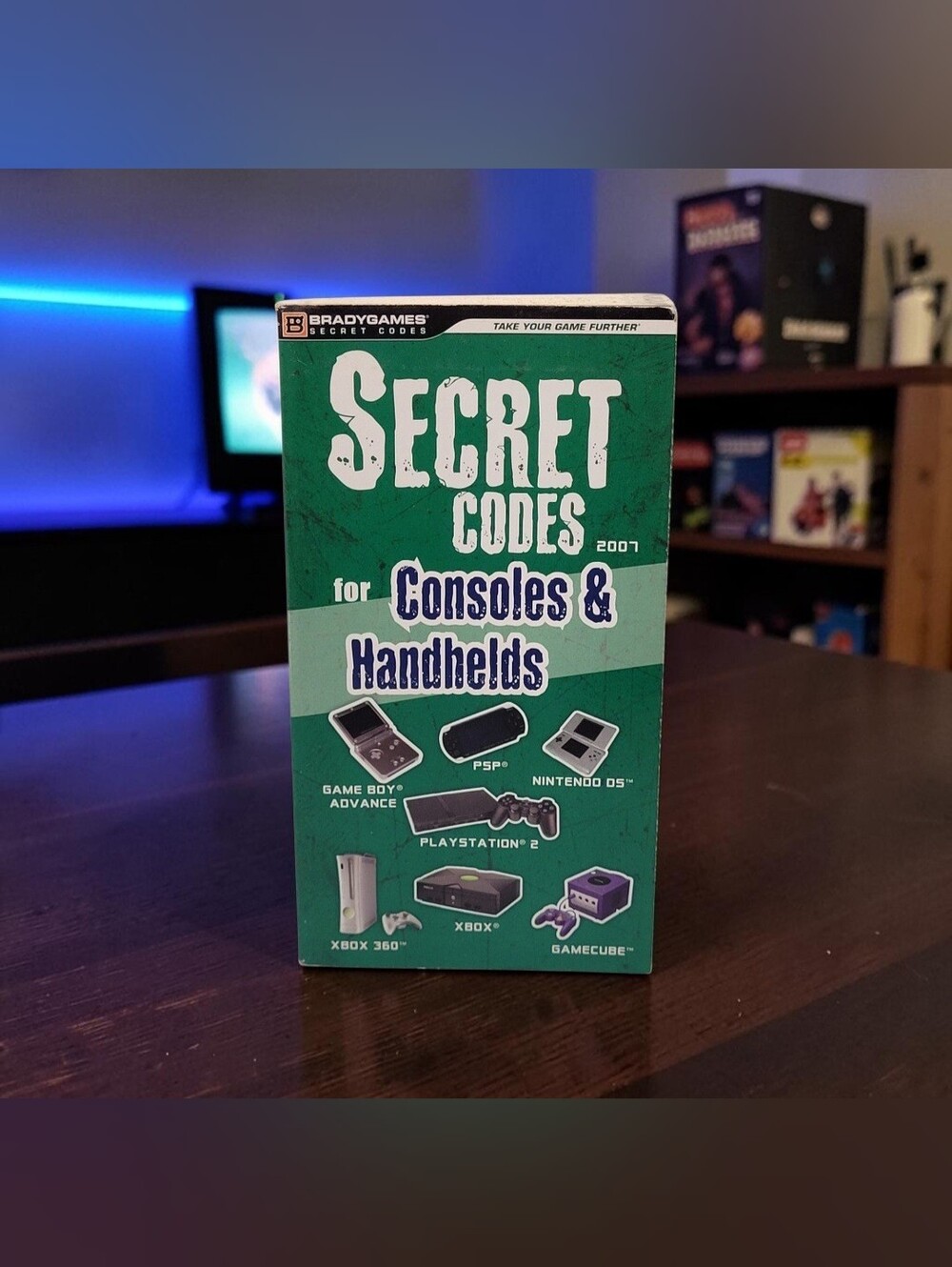2007 Secret Codes for Games Consoles & Handhelds Paperback Book by Brady Games.